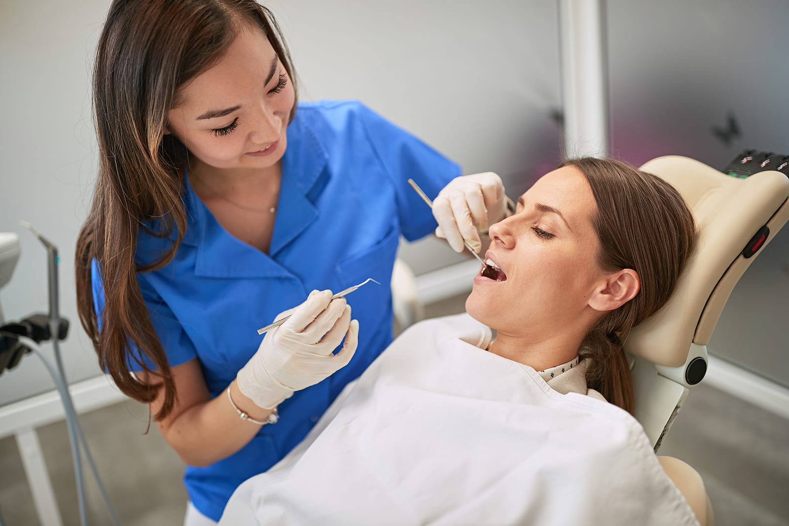 Bigstock Young Woman At The Dentist Smi 335227495 